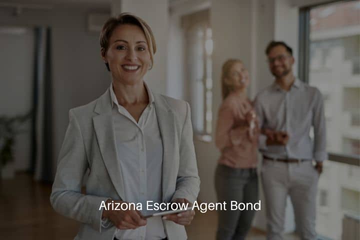 Arizona Escrow Agent Bond - Portrait of happy agent looking at the camera while her clients are standing in the back.