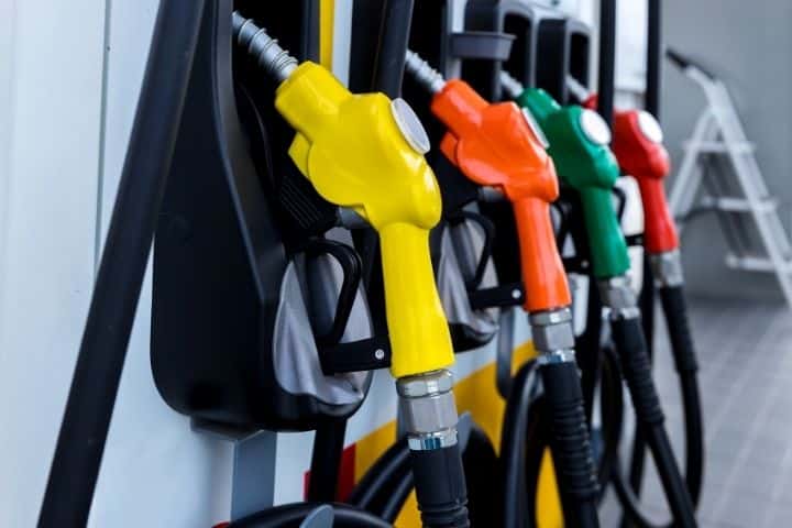 Jefferson County, AL-Gasoline Fuel Tax Bond-Petrol pump filling fuel a nozzle in a gas station. Fuel pump, gas station, gasoline.