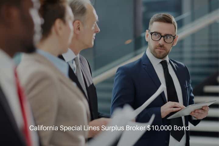 California Special Lines Surplus Broker $10,000 Bond - Serious broker in suit and eyeglasses looking at his colleagues during discussion.