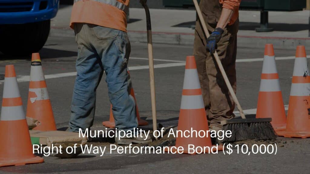 Municipality of Anchorage-Right of Way Performance Bond ($10,000) - Road construction. Workers repairing the pavement on a street.