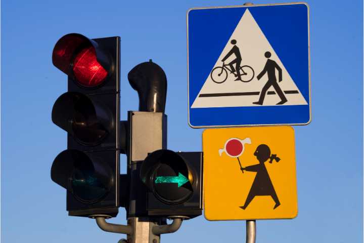 California Traffic Violator School (TVS) Owner $2,000 Bond - Traffic lights and signs near school.