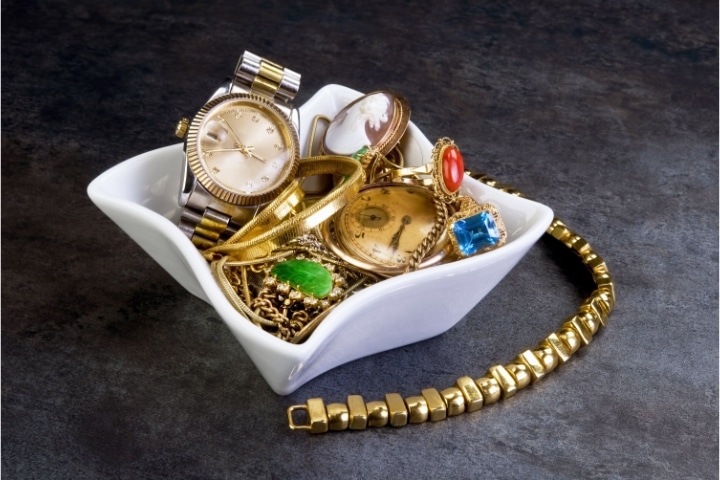 Florida Pawnbroking ($10,000) Bond - Pawnbroker concept. A scrap gold jewelry.
