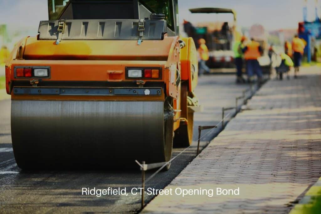 Ridgefield, CT-Street Opening Bond - Asphalt machinery at road construction site.