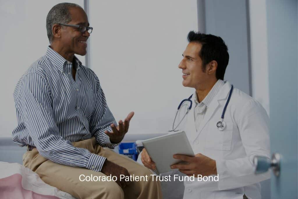 Colorado Patient Trust Fund Bond - Doctor in surgery with male patient using digital tablet.