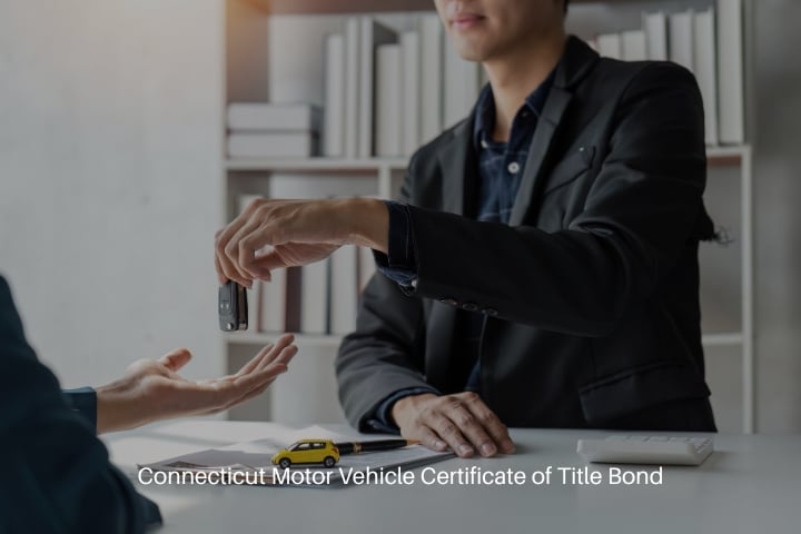 Connecticut Motor Vehicle Certificate of Title Bond - Businessman giving a car key after signing the certificate of title.