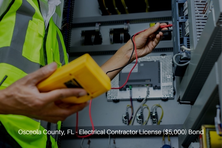 Osceola County, FL - Electrical Contractor License ($5,000) Bond - Hand of an electrician with multimeter probe at an electrical switchgear cabinet.