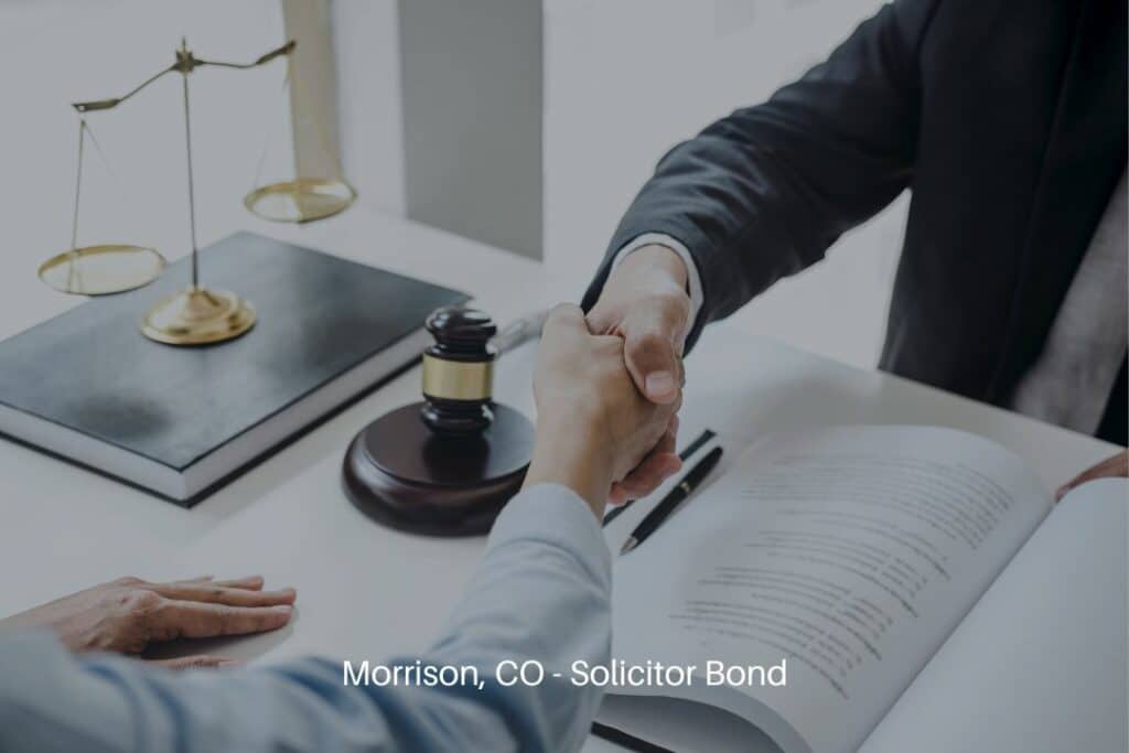Morrison, CO - Solicitor Bond - Lawyer shaking hands with clients in the office.