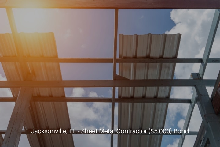 Jacksonville, FL - Sheet Metal Contractor ($5,000) Bond - The construction worker is laying the roof with metal sheet.