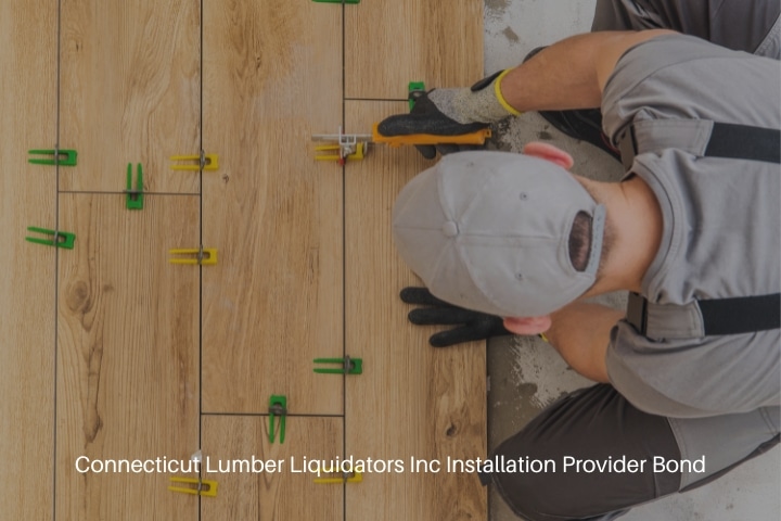 Connecticut Lumber Liquidators Inc Installation Provider Bond - Men installing ceramic floor.