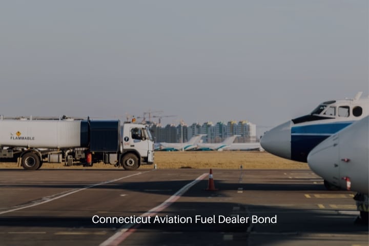 Connecticut Aviation Fuel Dealer Bond - A modern fuel tanker truck driving on the airfield taxiway for aircraft refueling.