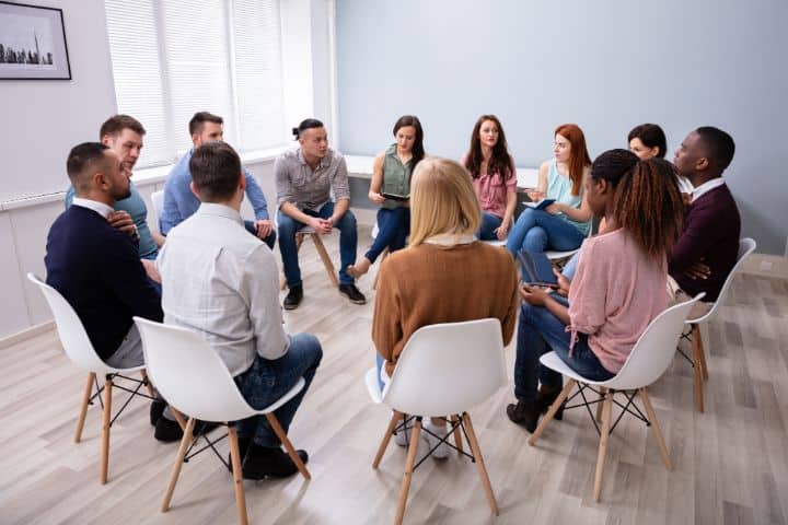 California Employment Counseling Service Bond ($10,000) Bond - Multi-ethnic people sitting in circle counseling.
