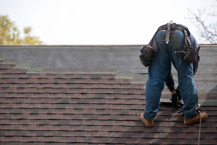 Palm Beach County, FL - Roofing Contractor ($10,000) Bond - Roofers installing new roof on house.