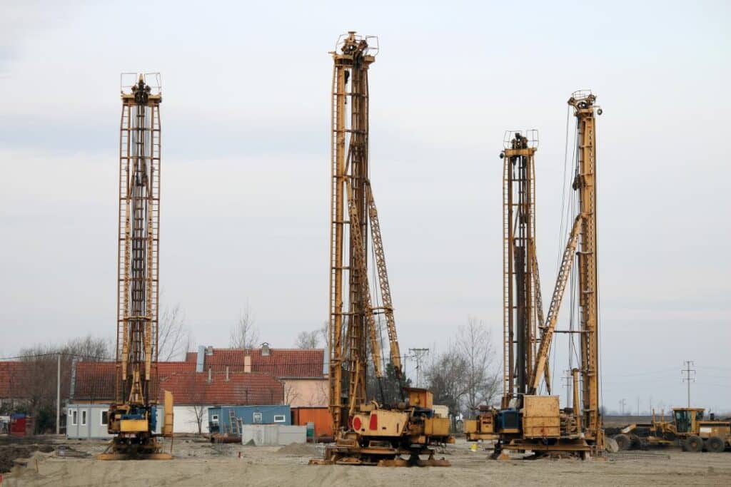 Tehama County, CA - Well Driller $5,000 Bond - Three drillers are at rest in the construction site.