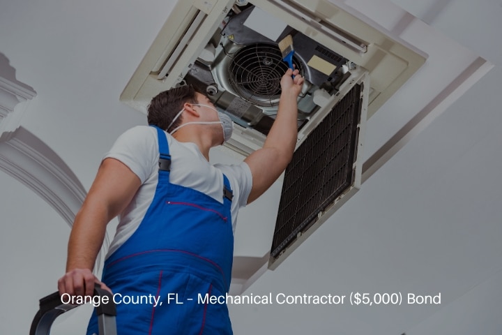 Orange County, FL - Mechanical Contractor ($5,000) Bond - Worker repairing ceiling air condition unit.