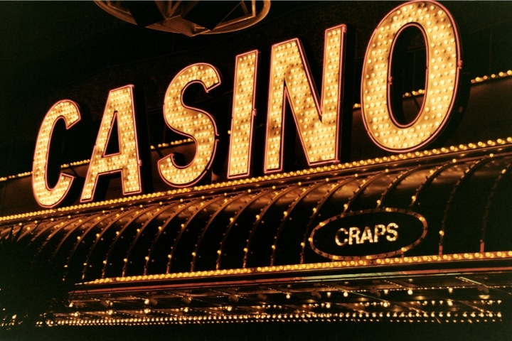 Pasco County, FL - Sign Contractor, Electrical ($5,000) Bond - Bright neon casino and craps sign.