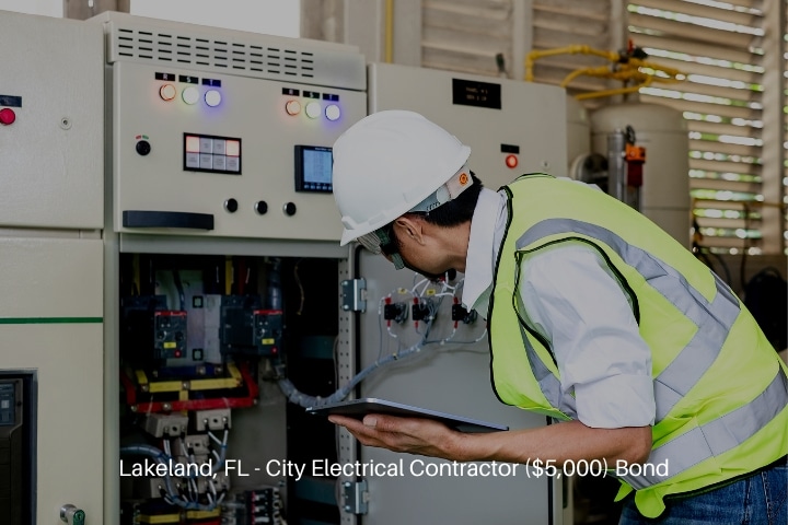 Lakeland, FL - City Electrical Contractor ($5,000) Bond - Electrical engineer inspecting the switchgear cabinet.