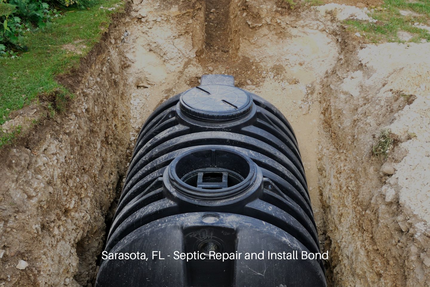 Sarasota, FL - Septic Repair and Install Bond - Installation of a septic tank in a domestic garden.
