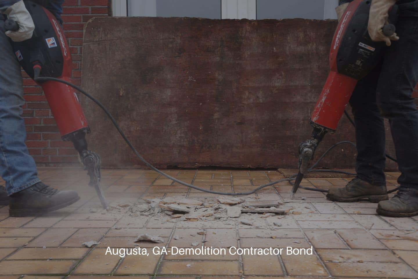 Augusta, GA-Demolition Contractor Bond - Jackhammer used by a contractor. Two demolition contractors.