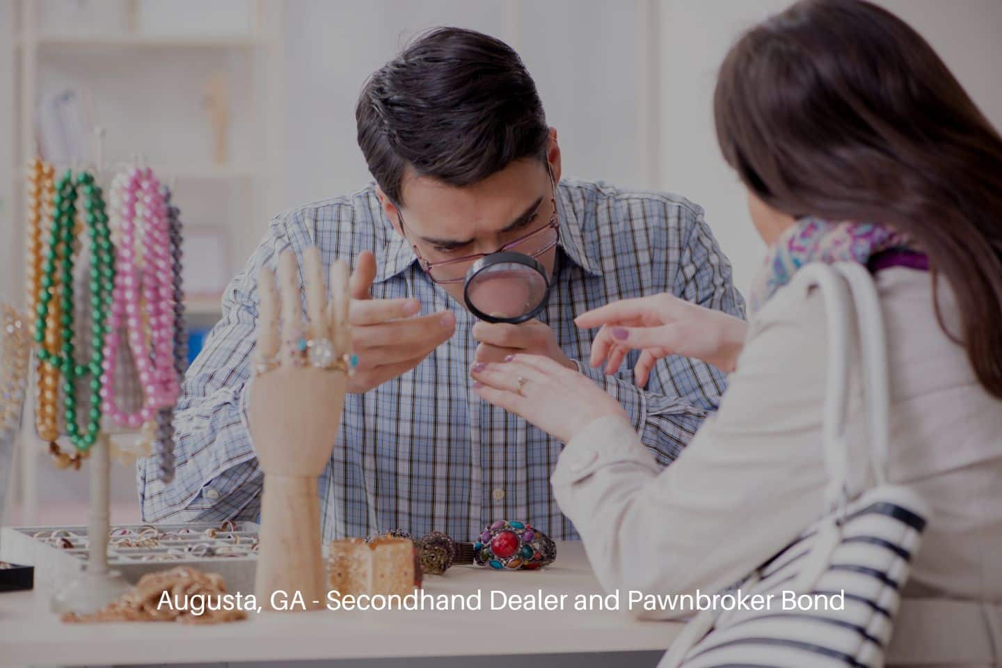 Augusta, GA - Secondhand Dealer and Pawnbroker Bond - Woman visiting jeweler for jewelry evaluation.
