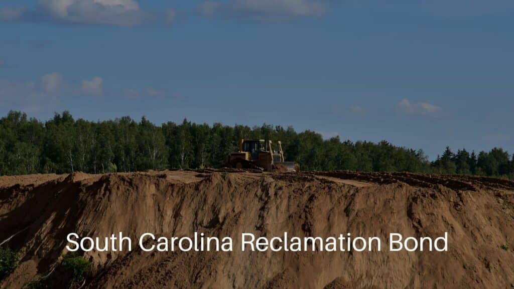 South Carolina Reclamation Bond - A bulldozer recovering the landscape around open put. Mine reclamation.