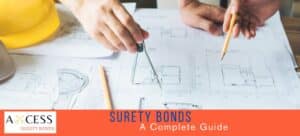 Contractors reviewing blueprints. Surety Bonds A Complete Guide at the bottom in text.