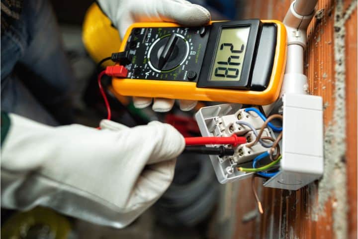 Montgomery, AL-Electrical Bond ($5,000)-Electrician at work on a residential electrical system.