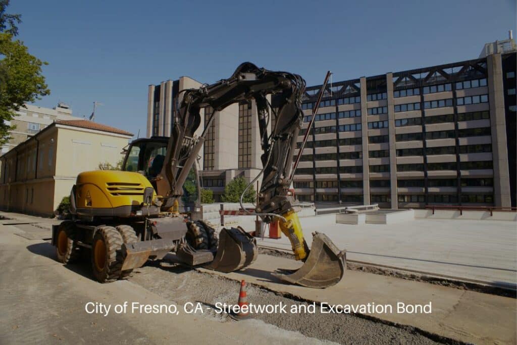 City of Fresno, CA - Streetwork and Excavation Bond - An excavator working in the street.