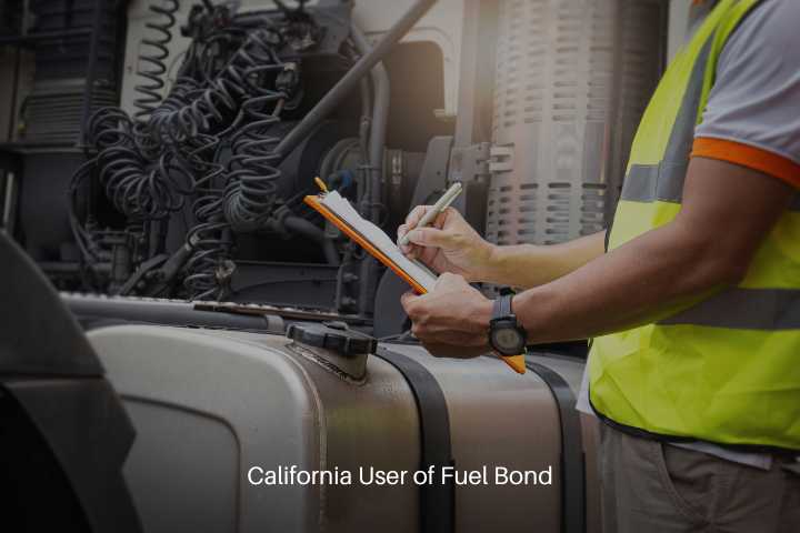 California User of Fuel Bond - Truck driver inspects the safety fuel tanks of semi trucks.