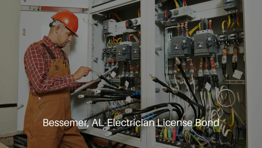 Bessemer, AL-Electrician License Bond - An electrician worker with an electrician scheme plan in front of the fuse switchboard.