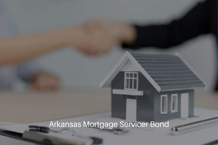 Arkansas Mortgage Servicer Bond - An agent of the mortgage servicer shakes hands with the client who acquires the house.