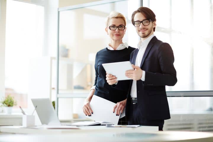 Arizona Mortgage Banker Bond - A male and a female mortgage banker at work.