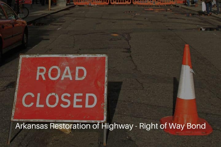 Arkansas Restoration of Highway - Right of Way Bond - Warning sign and traffic cones on a street closed for road works.