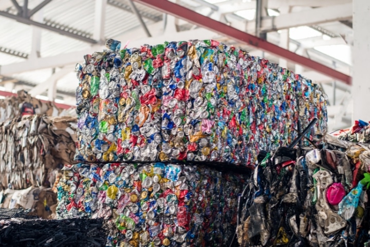 Bridgeport, CT-Waste Hauler Bond - Compressed metal garbage at waste sorting plant.