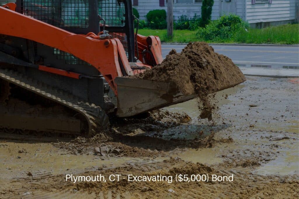 Plymouth, CT - Excavating ($5,000) Bond - The construction excavator is moving the scoop of dirt.