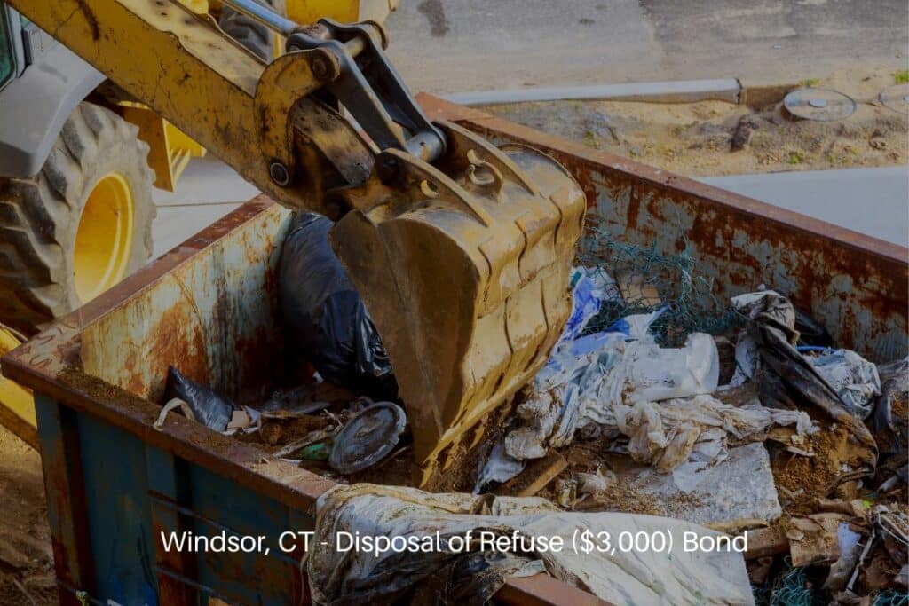 Windsor, CT - Disposal of Refuse ($3,000) Bond - Wheel material handler dumping refuse disposal with excavator shovel.