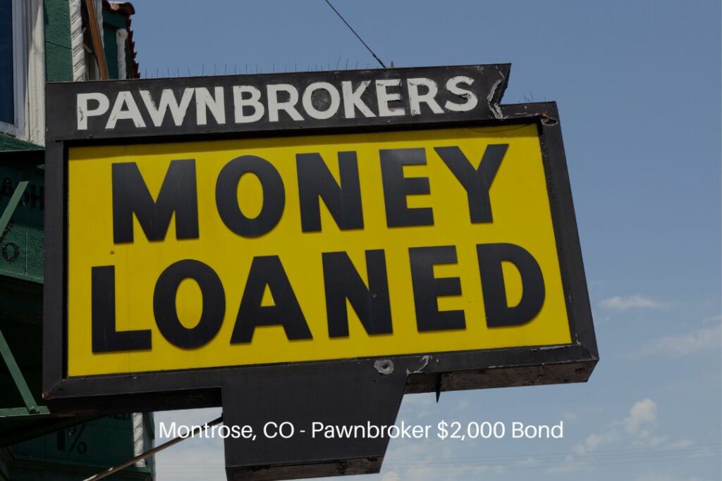 Montrose, CO - Pawnbroker $2,000 Bond - Black on yellow pawn shop sign. Money loaded place.