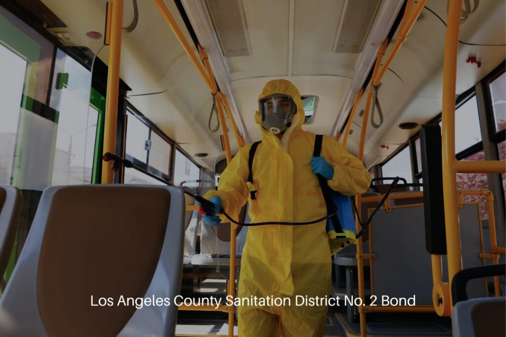 Los Angeles County Sanitation District No. 2 Bond - Public transport sanitation. A worker in Protective suit to disinfect inside a bus.