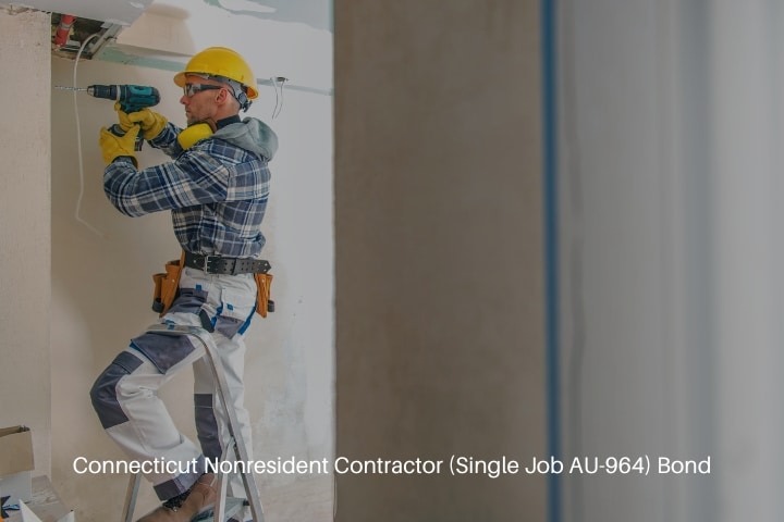 Connecticut Nonresident Contractor (Single Job AU-964) Bond - Construction contractor worker with cordless power tool during apartment remodeling job.