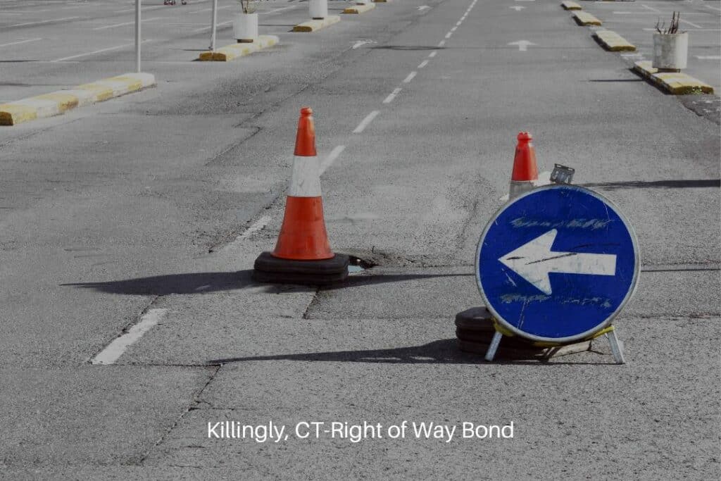 Killingly, CT-Right of Way Bond - Road detour sign and cones due to pothole.