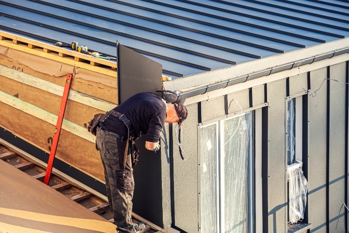 Osceola County, FL - Sheet Metal Contractor ($5,000) Bond - Roofer installs the sheet on the facade.