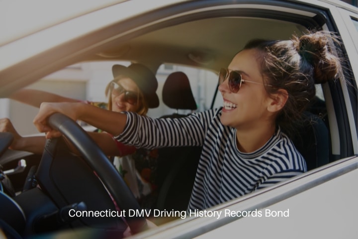 Connecticut DMV Driving History Records Bond - Two fun you woman in sunglasses driving in a car.