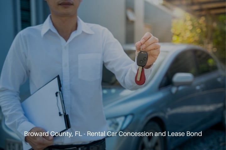 Broward County, FL - Rental Car Concession and Lease Bond - A rental car concept. A guy is holding the key with his contract.