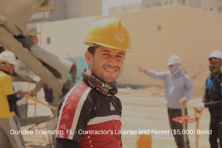 Dundee Township, FL - Contractor's License and Permit ($5,000) Bond - Construction worker smiling with his coworker and cement mixer.