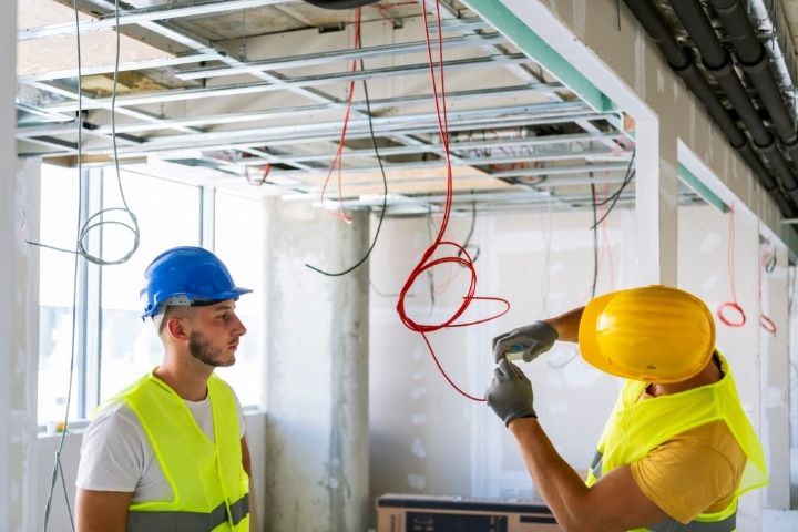 Manatee County, FL - Electrician Bond ($20,000) - Electrician making wiring at new house.