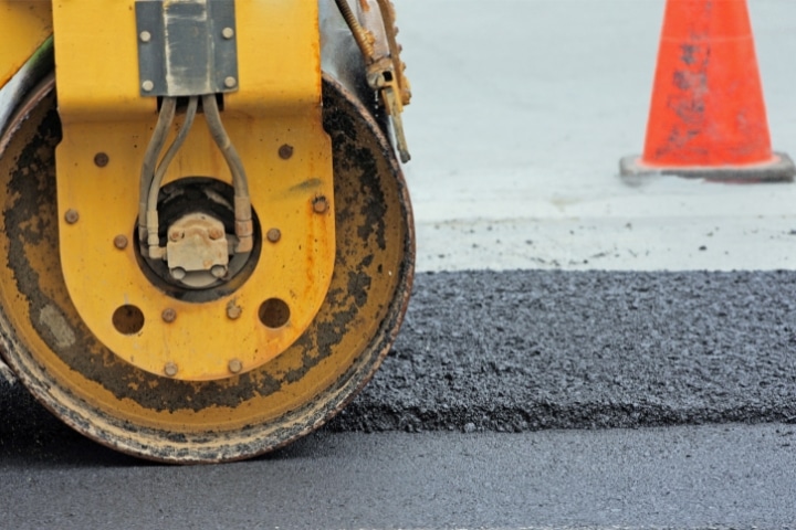 Escambia County, FL - Road Restoration Permit ($10,000) Bond - Road repair with bulldozer.