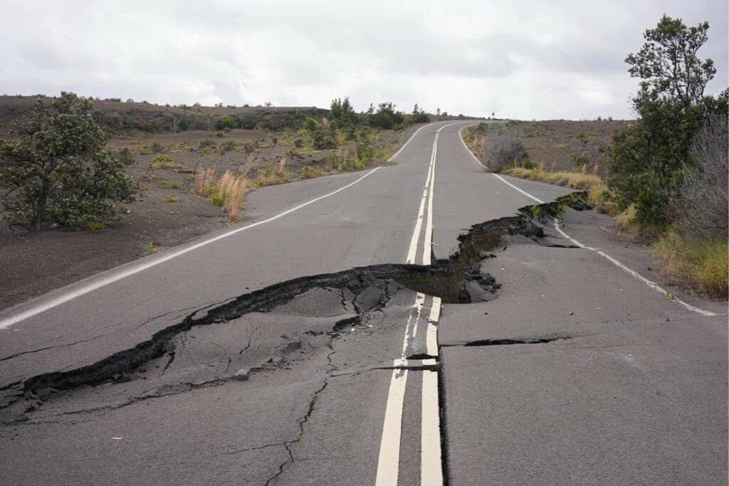 Asphalt road damage by the volcanic eruption and subsequent earthquake.