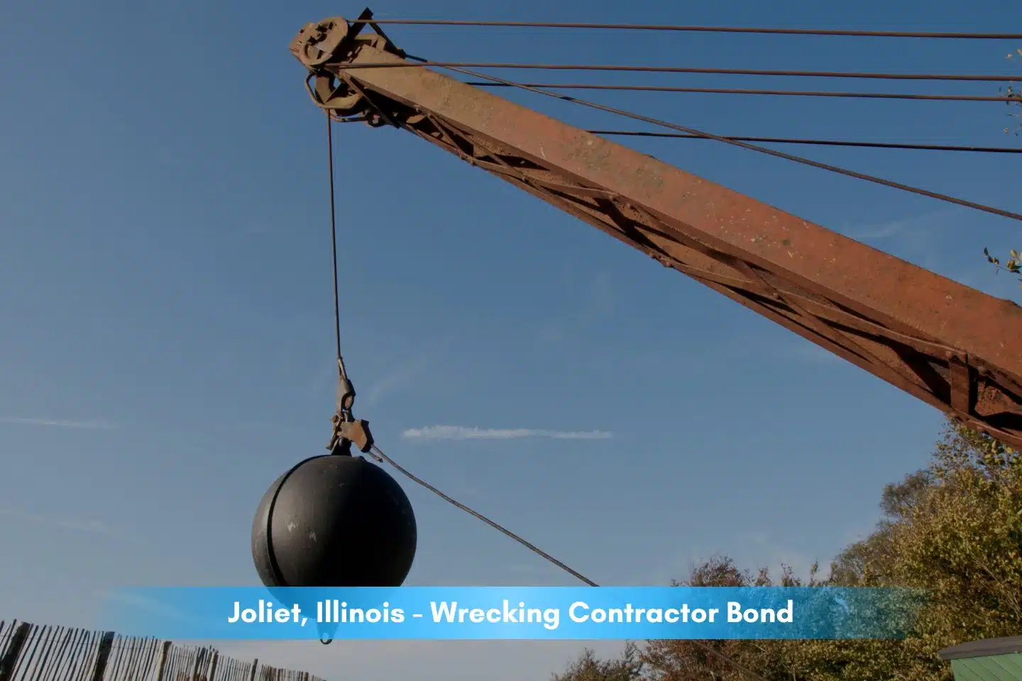 Joliet, IL - Wrecking Contractor Bond - A wrecking wall on an old crane.