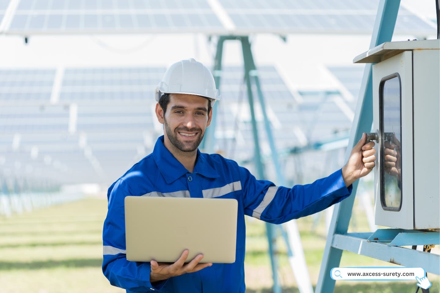 Male electrician worker checking operation electric system at the solar farm.
