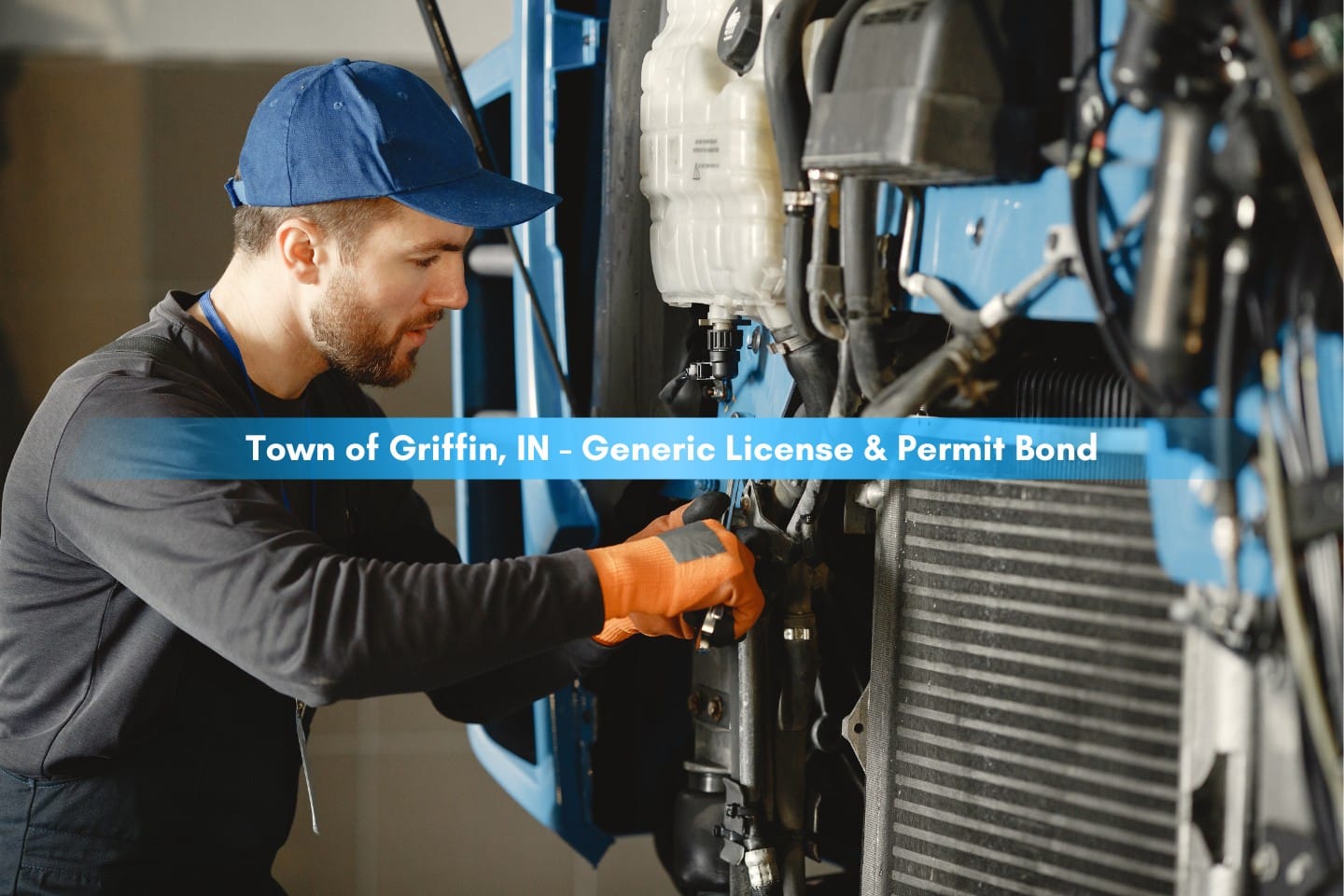 Town of Griffin, IN - Generic License & Permit Bond - Man in Black long sleeve shirt repairing a machine.