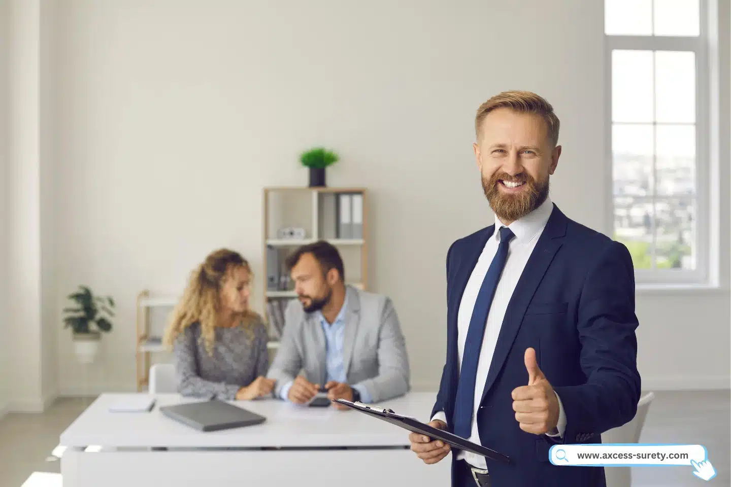 Portrait of a happy confident mortgage broker in suit looking at camera.